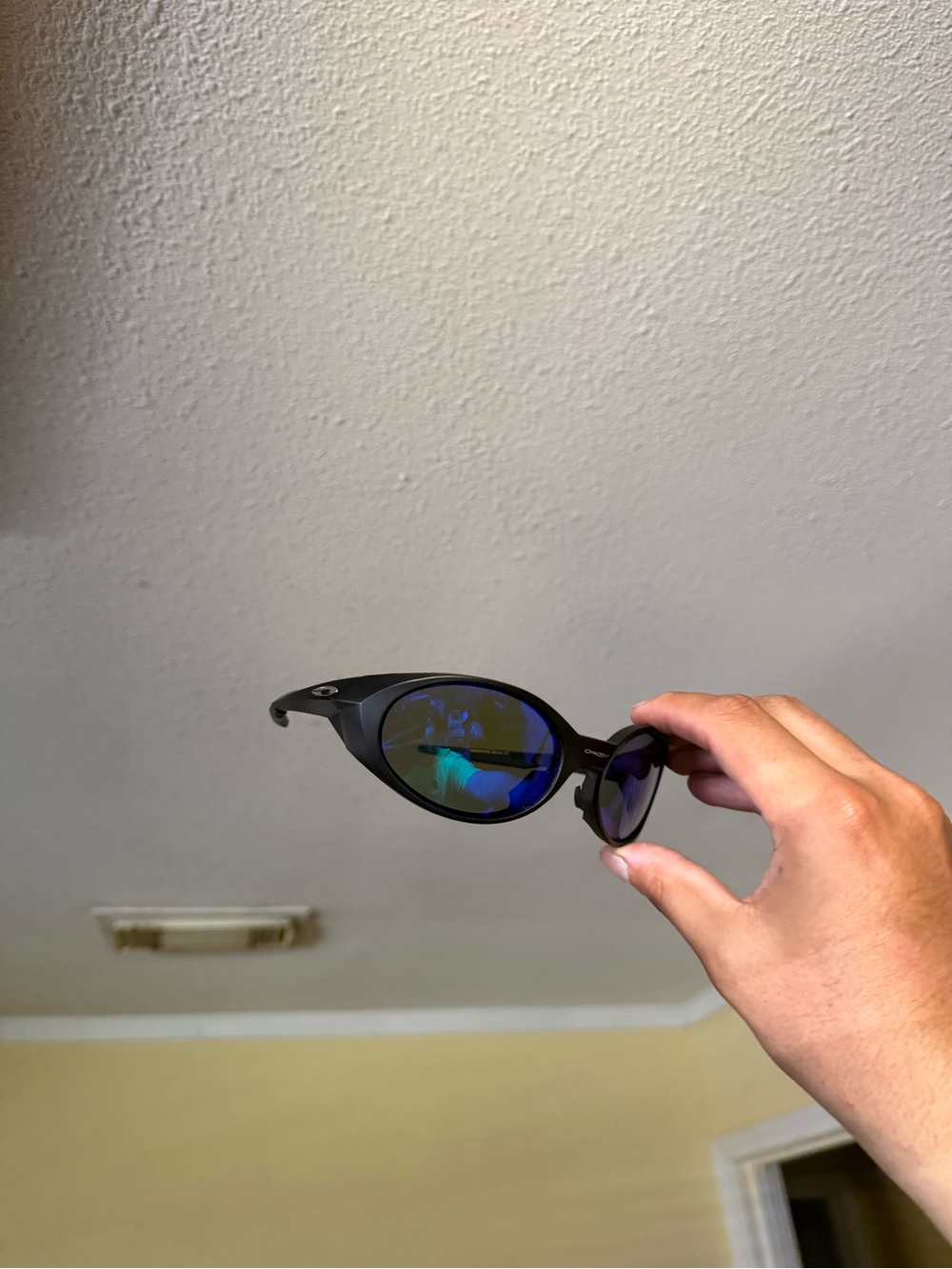 Black Sunglasses with Blue Mirrored Lenses Oakley